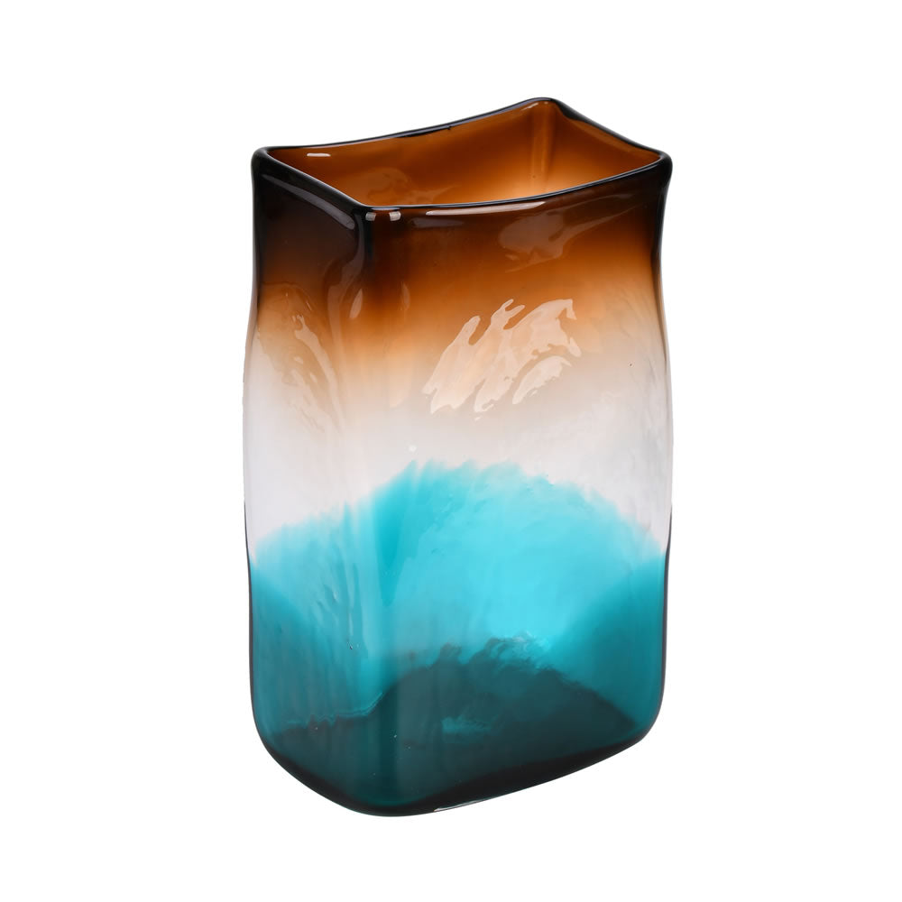Vickerman 10" Burnt Sienna Rectangle Glass Vase. This vase features a beautiful fade of brown to blue. Tie neutral tones into your modern décor with an accent of blue. Pair this vase with your favorite faux floral for the perfect finishing touch. Each vas