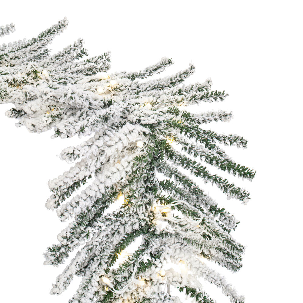 Vickerman 9' x 14" Flocked Pistol Pine Garland with Warm White LED Lights.