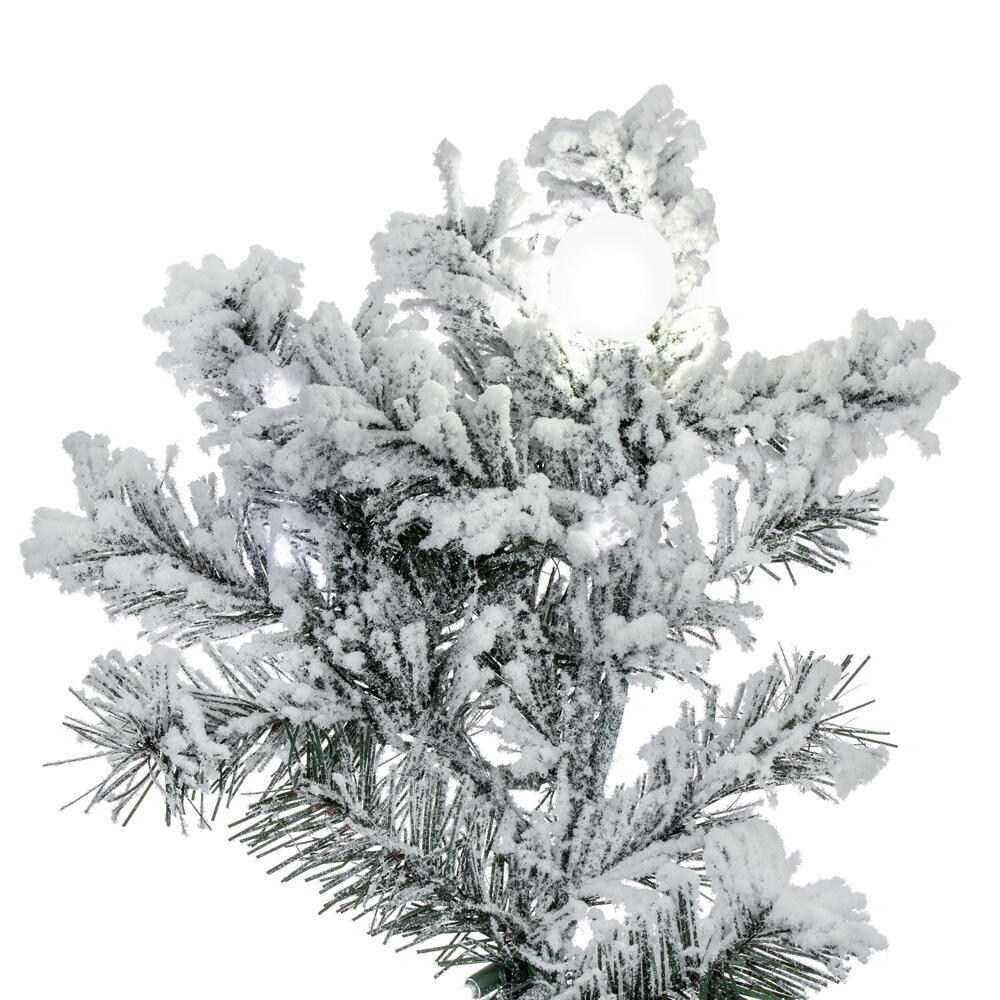 Vickerman 5.5' x 49" Flocked Alaskan Artificial Pre-Lit Christmas Tree with 34 Pure White G40 and 500 Pure White LED Mini Lights, 653 Flocked Realistic PVC Tips, 6' Step On/Off Power Cord and Folding Metal Tree Stand. Assembly is required.