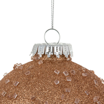 Vickerman 4" Rose Gold Ice Ball Ornament. This textured ornament has a rough and icy look with a hint of delicate sparkle. Incorporate these ornaments into your holiday design for added texture. Includes 6 pieces per pack. Made with shatterproof plastic.