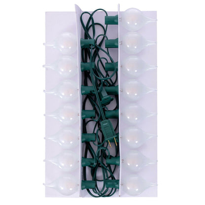 Vickerman 15 lights x 15' Warm White LED G45 Glass Flame Tip light set. 6" on green wire.