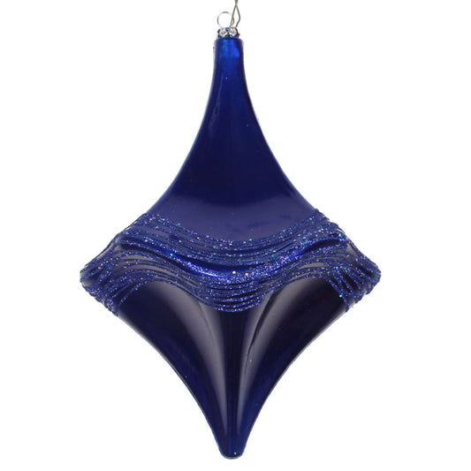 Vickerman 8" Cobalt Blue Candy Glitter Drop Ornament. This ornament is the perfect addition to any holiday decorating project. Each ornament features a drilled cap with threaded wire for easy decorating.