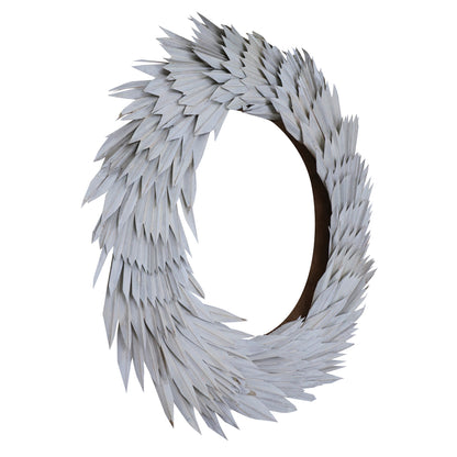 Vickerman Natural Botanicals 24" White Washed Palm Sun Wreath. This wreath measures 24 inches in diameter. It features white washed palm sun leaves on a coco fiber base. This is a dried and preserved natural product.