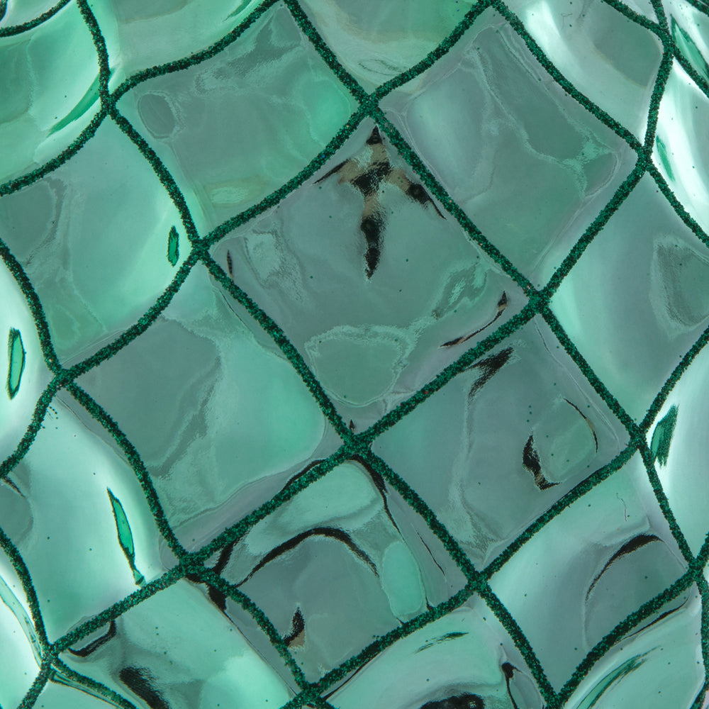 Vickerman 6" Seafoam Green Shiny Form Ball Drilled Wired 4/Bag. Add texture and shimmer to your holiday decorating projects with this geometric shaped ball. It features glitter accents along the edges of the geometric pattern. This ornament contains a dri
