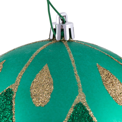 Vickerman 4.75" Seafoam Green Matte Ball with Glitter Diamond Pattern. Add variety and sparkle to your holiday arrangement with this matte ornament that features a glitter pattern. Includes 4 pieces per bag. Made with shatterproof plastic. Ornament has a