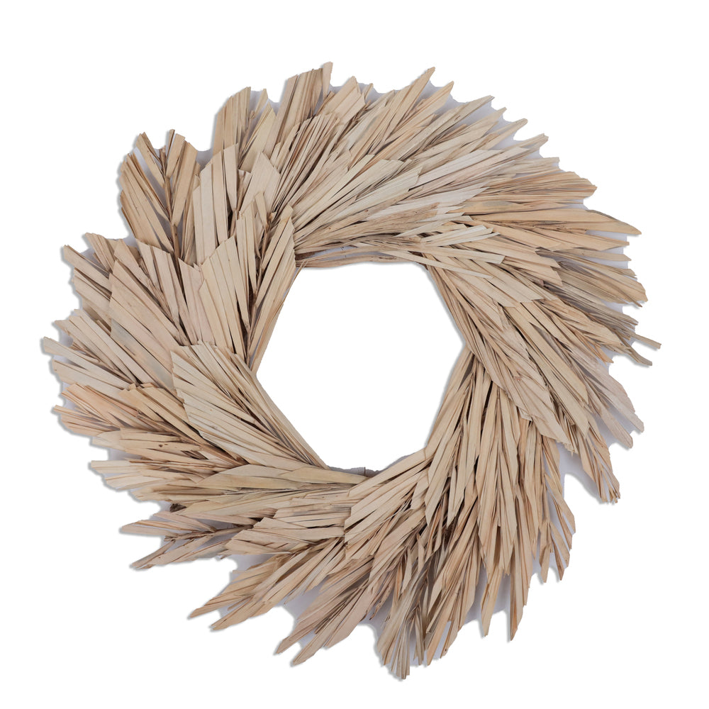 Vickerman Natural Botanicals 17" Bleached Canna Leaf Wreath. This wreath measures 17 inches in diameter. It features bleached canna leaves on a coco fiber base. This is a dried and preserved natural product.