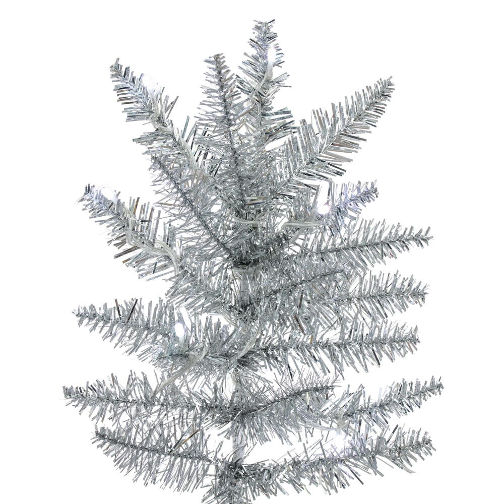 Vickerman 7.5' x 41" Silver Slim Artificial Pre-Lit Christmas Tree with 504 Wide Angle 5mm 32 Function Remote Controlled RGB LED Mini Lights. It measures 90 inches tall, and 41 inches wide, which is considered a Slim profile. This tree boasts 1238 tips fo