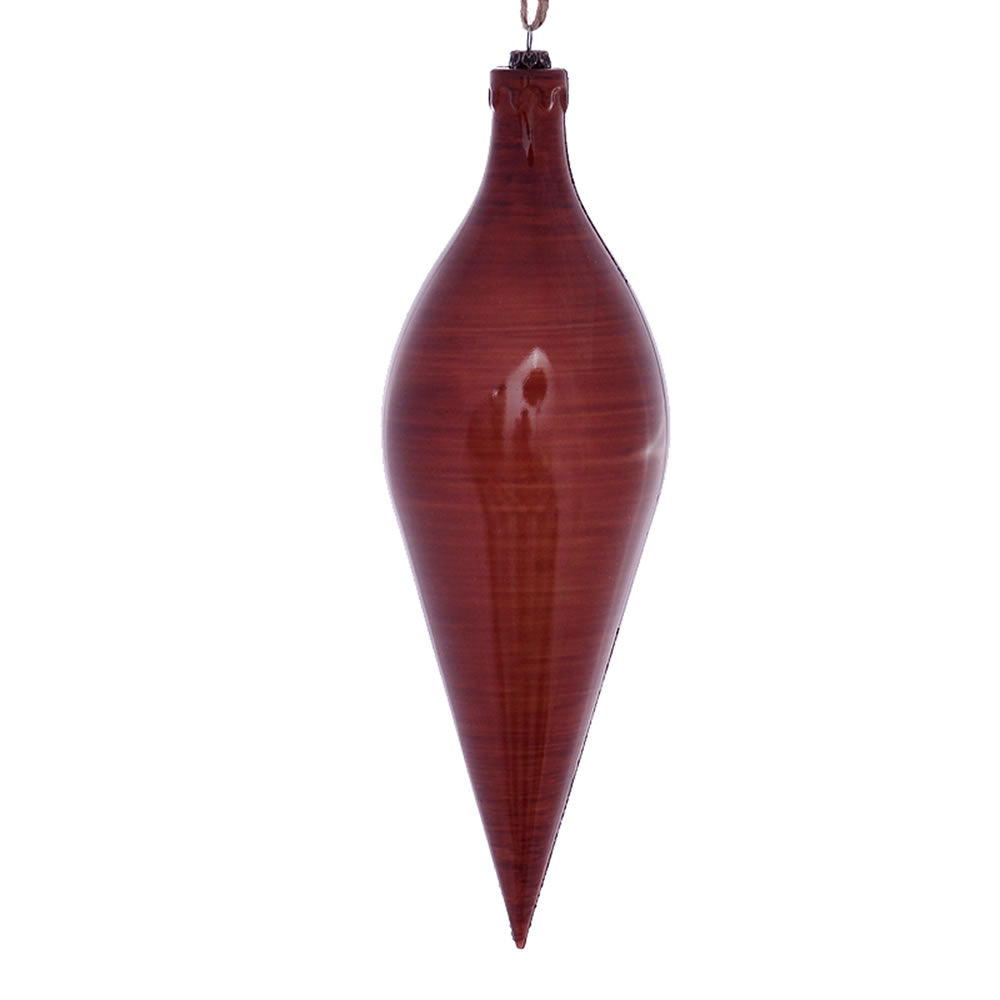 Vickerman 12" Copper Wood Grain Shuttle Ornament. These ornaments are the perfect addition to any holiday decorating project. They features a light wood grain pattern. Includes 2 pieces per pack.