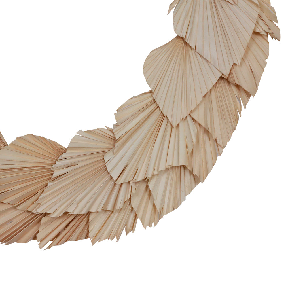 Vickerman Natural Botanicals 24" Bleached Palm Spear Wreath. This wreath measures 24 inches in diameter. It features bleached palm spear leaves on a coco fiber base. This is a dried and preserved natural product.