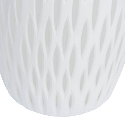 Vickerman 13" White Frosted Glass Vase. This lightly frosted vase is accented with a white diamond pattern. Pair this vase with your favorite faux floral for the perfect finishing touch. Each vase is slightly unique because each piece is hand blown. This