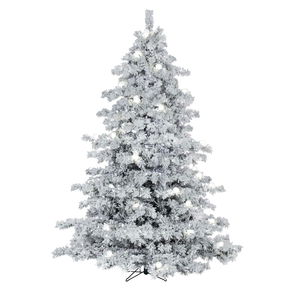 Vickerman 4.5' x 44" Flocked Alaskan Artificial Pre-Lit Christmas Tree with 28 Pure White G40 and 300 Pure White LED Mini Lights, 349 Flocked Realistic PVC Tips, 6' Step On/Off Power Cord and Folding Metal Tree Stand. Assembly is required.