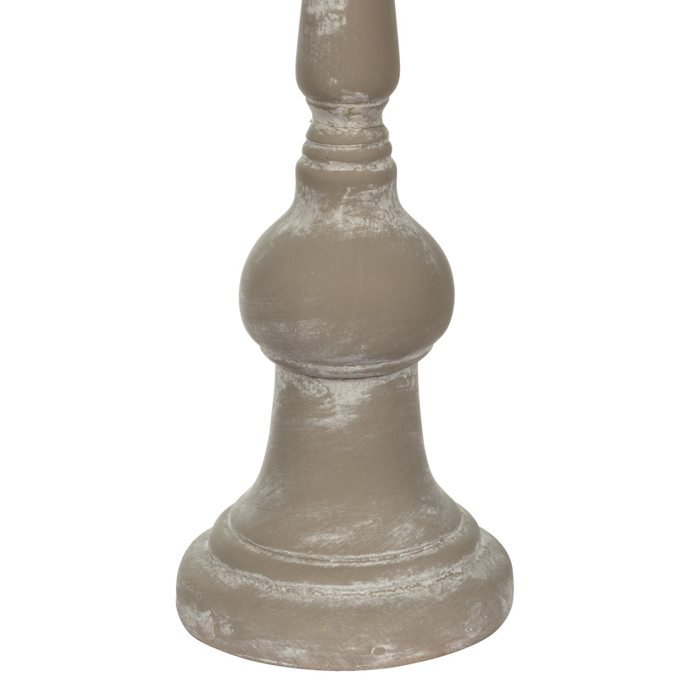 Vickerman 20.8" White Candlestick Polyresin. This candle stick is made of durable polyresin material. It features a modern shape with brushed accents. The candlestick measures 20.75" H x 5.75" W. It best suits a candle that is 3 inches in diameter.