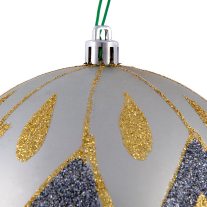 Vickerman 4.75" Limestone Matte Ball with Glitter Diamond Pattern. Add variety and sparkle to your holiday arrangement with this matte ornament that features a glitter pattern. Includes 4 pieces per bag. Made with shatterproof plastic. Ornament has a dril