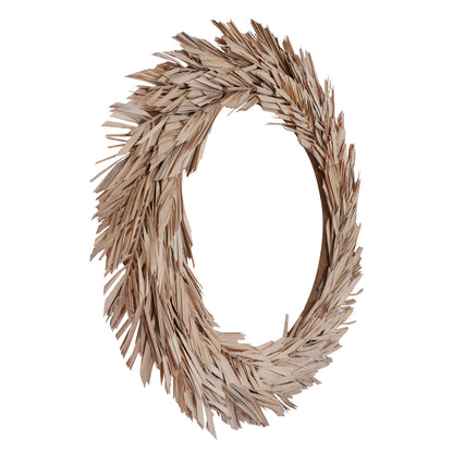 Vickerman Natural Botanicals 24" Bleached Canna Leaf Wreath. This wreath measures 24 inches in diameter. It features bleached canna leaves on a coco fiber base. This is a dried and preserved natural product.