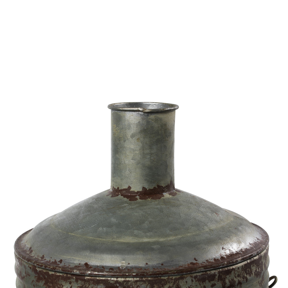 Vickerman 19.5" Rustic Metal Container with Handles. This metal container is the perfect addition to any modern farm style decor. This rustic piece is the perfect addition to any table top setting. It measures 10.5" L x 11" W x 19.5" H.   90% METAL 10% JU