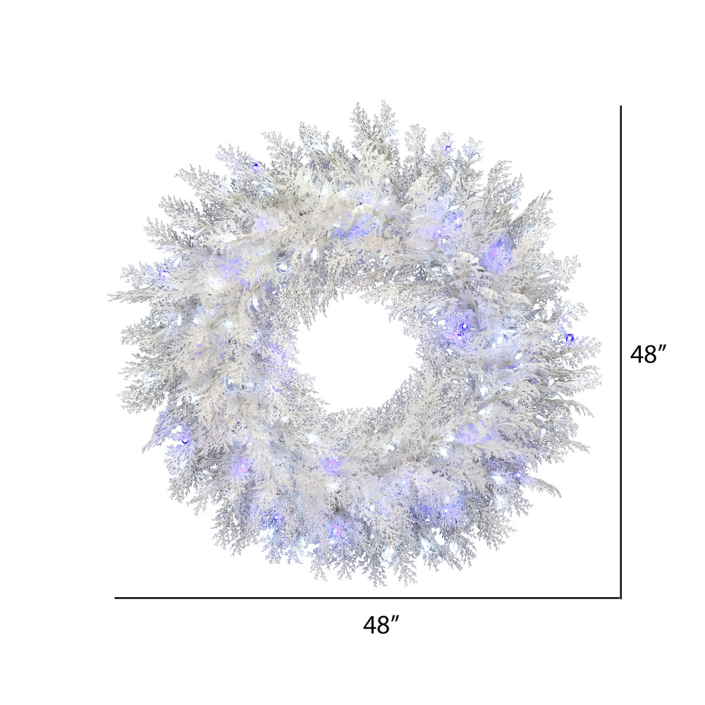 Vickerman 48" Flocked Cedar Pine Artificial Christmas Wreath Pure White and Blue Low Voltage LED Wide Angle Twinkle Lights.