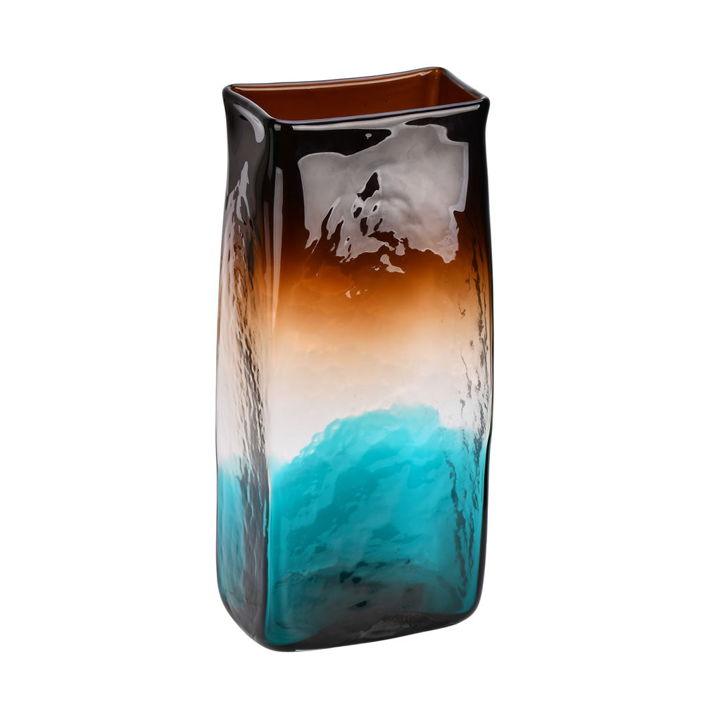 Vickerman 14" Burnt Sienna Rectangle Glass Vase. This vase features a beautiful fade of brown to blue. Tie neutral tones into your modern décor with an accent of blue. Pair this vase with your favorite faux floral for the perfect finishing touch. Each vas