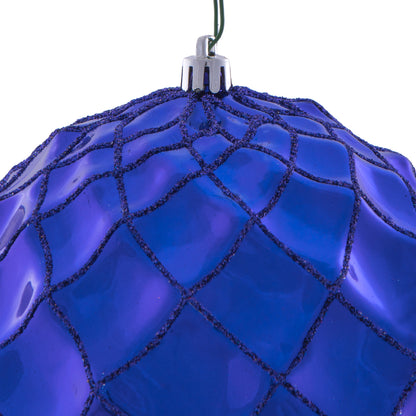 Vickerman 6" Cobalt Blue Shiny Form Ball Drilled Wired 4/Bag. Add texture and shimmer to your holiday decorating projects with this geometric shaped ball. It features glitter accents along the edges of the geometric pattern. This ornament contains a drill