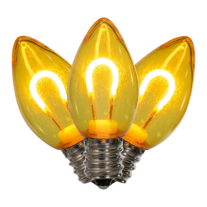 Vickerman C7 Transparent U-Shaped Filament Yellow Bulb, E12 Base, .6 Watts, 25 Pcs Assorted/Bag.  Colors included are Blue, Red, Green, Purple and Amber.