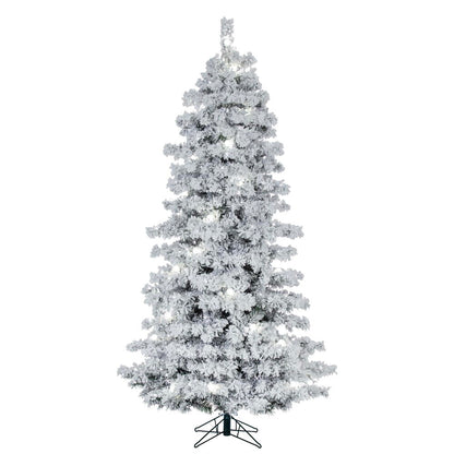 Vickerman 6.5' x 44" Flocked Slim Alaskan Artificial Pre-Lit Christmas Tree with 35 Pure White G40 and 450 Pure White LED Mini Lights, 836 Flocked Realistic PVC Tips, 6' Step On/Off Power Cord and Folding Metal Tree Stand. Assembly is required.