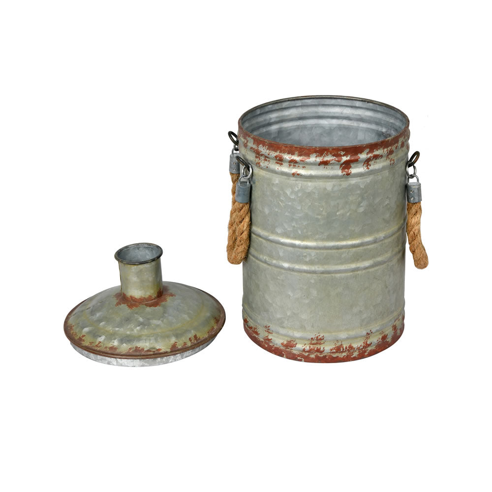 Vickerman 13.5" Rustic Metal Container with Handles. This metal container is the perfect addition to any modern farm style decor. This rustic piece is the perfect addition to any table top setting. It measures 13.5" H x 7.75" L x 8.25" W.   90% METAL 10%