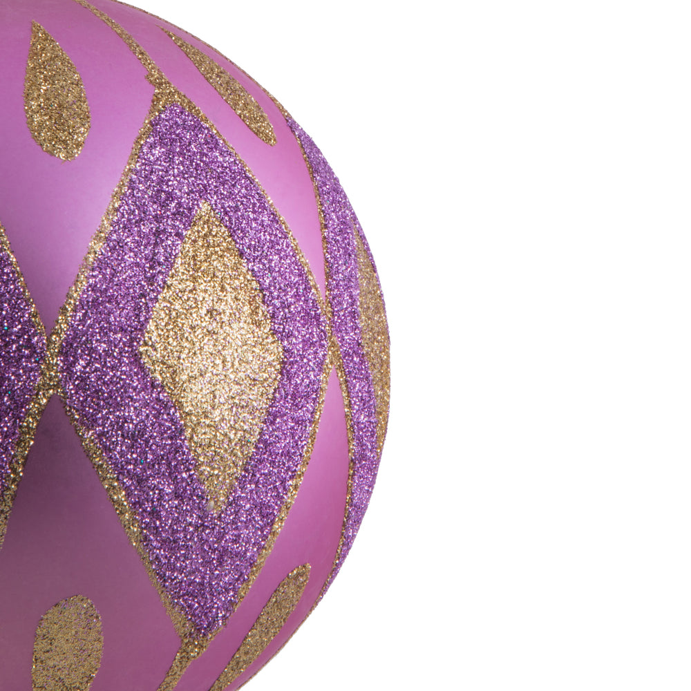 Vickerman 4.75" Orchid Matte Ball with Glitter Diamond Pattern. Add variety and sparkle to your holiday arrangement with this matte ornament that features a glitter pattern. Includes 4 pieces per bag. Made with shatterproof plastic. Ornament has a drilled