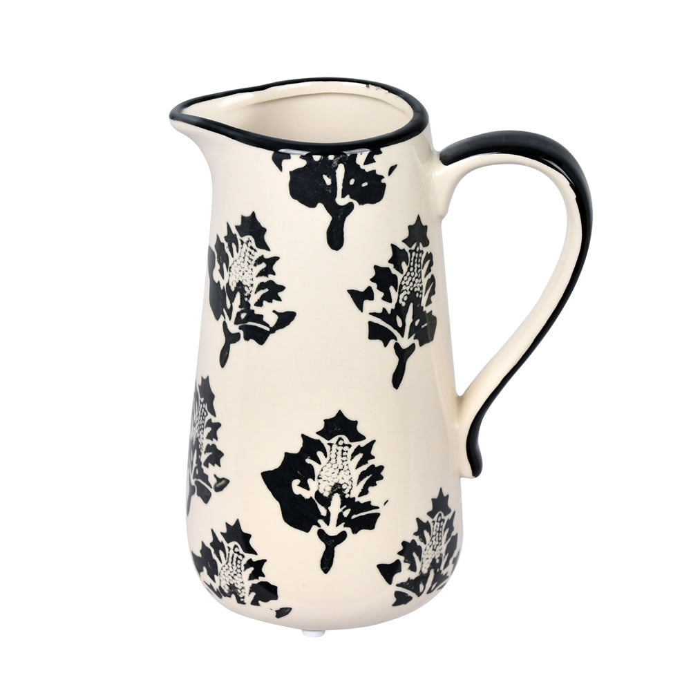 Vickerman 6.5" White/Black Leaf Print Ceramic Jar. Let this pot stand on its own or pair with a faux floral for a finished look. It measures 6.5" H x 5" W.   100% CERAMIC