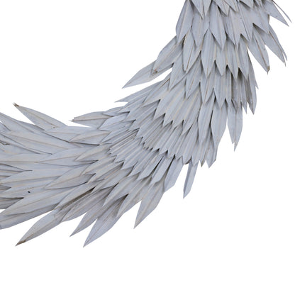 Vickerman Natural Botanicals 24" White Washed Palm Sun Wreath. This wreath measures 24 inches in diameter. It features white washed palm sun leaves on a coco fiber base. This is a dried and preserved natural product.