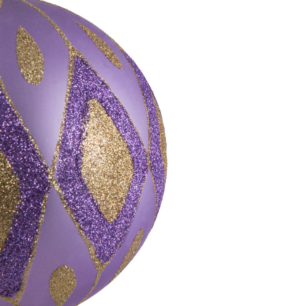 Vickerman 4.75" Lavender Matte Ball with Glitter Diamond Pattern. Add variety and sparkle to your holiday arrangement with this matte ornament that features a glitter pattern. Includes 4 pieces per bag. Made with shatterproof plastic. Ornament has a drill