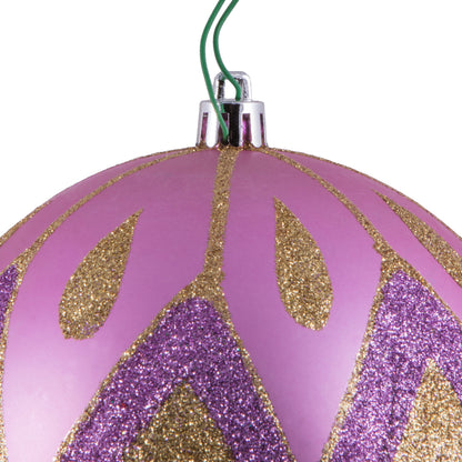 Vickerman 4.75" Orchid Matte Ball with Glitter Diamond Pattern. Add variety and sparkle to your holiday arrangement with this matte ornament that features a glitter pattern. Includes 4 pieces per bag. Made with shatterproof plastic. Ornament has a drilled