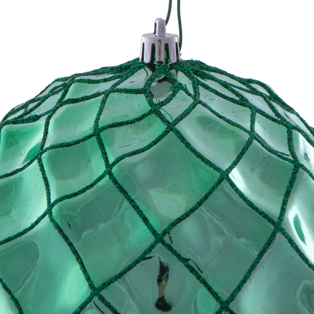 Vickerman 6" Seafoam Green Shiny Form Ball Drilled Wired 4/Bag. Add texture and shimmer to your holiday decorating projects with this geometric shaped ball. It features glitter accents along the edges of the geometric pattern. This ornament contains a dri