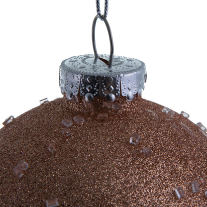 Vickerman 4.75" Rose Gold Ice Ball Ornament. This textured ornament has a rough and icy look with a hint of delicate sparkle. Incorporate these ornaments into your holiday design for added texture. Includes 4 pieces per pack. Made with shatterproof plasti