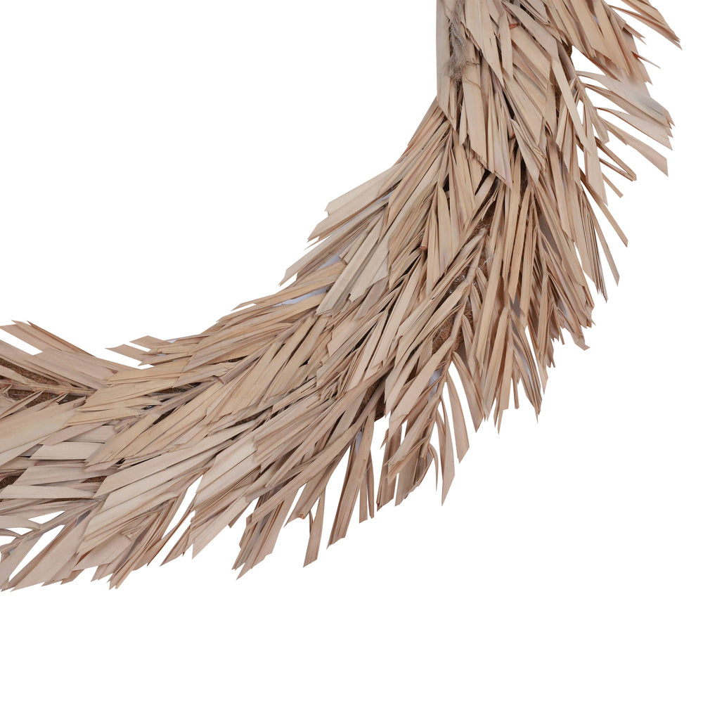 Vickerman Natural Botanicals 24" Bleached Canna Leaf Wreath. This wreath measures 24 inches in diameter. It features bleached canna leaves on a coco fiber base. This is a dried and preserved natural product.