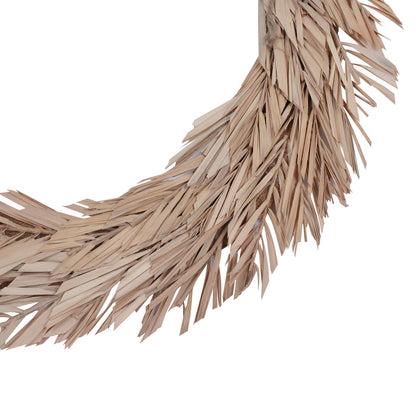 Vickerman Natural Botanicals 24" Bleached Canna Leaf Wreath. This wreath measures 24 inches in diameter. It features bleached canna leaves on a coco fiber base. This is a dried and preserved natural product.