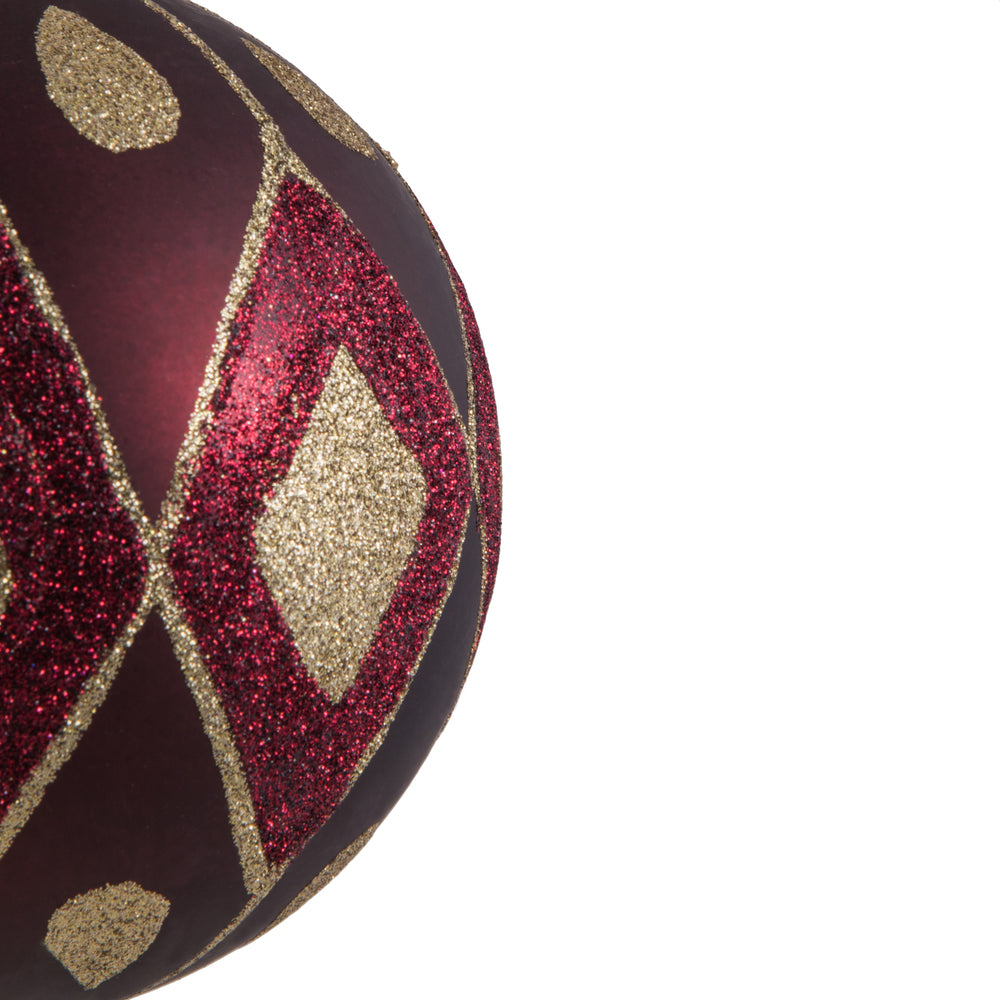 Vickerman 4.75" Wine Matte Ball with Glitter Diamond Pattern. Add variety and sparkle to your holiday arrangement with this matte ornament that features a glitter pattern. Includes 4 pieces per bag. Made with shatterproof plastic. Ornament has a drilled c