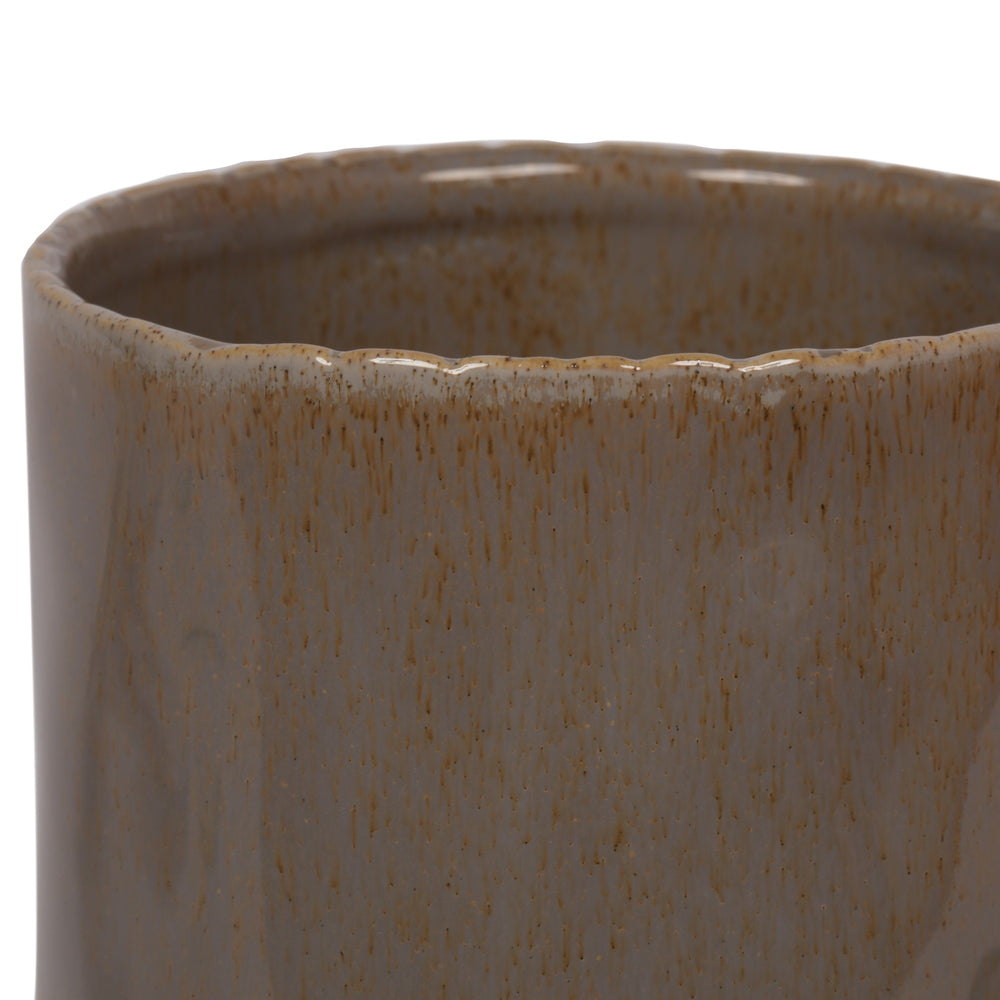 Vickerman 11.25" Pine Green Ceramic Pot. This simple pot ties in with any modern decor. Let this pot stand on its own or pair with a faux floral for a finished look. This pot meausures 11.25 inches tall and 4.5 inches wide.  100% CERAMIC