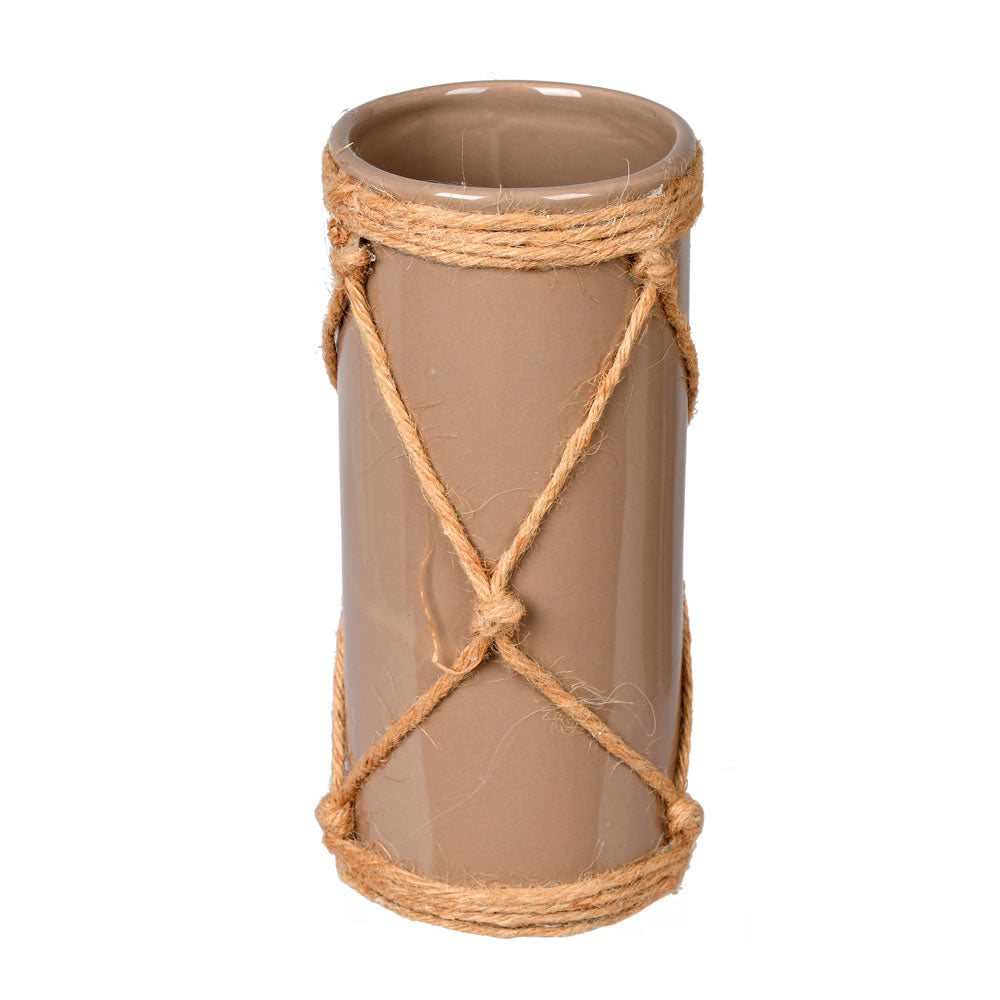 Vickerman 8" Sandstone Ceramic Vase in Jute Rope. This vase features a sturdy ceramic construction and thick jute rope hanger. It measures 8 inches tall by 3.75 inches wide.  90% CERAMIC 10% JUTE