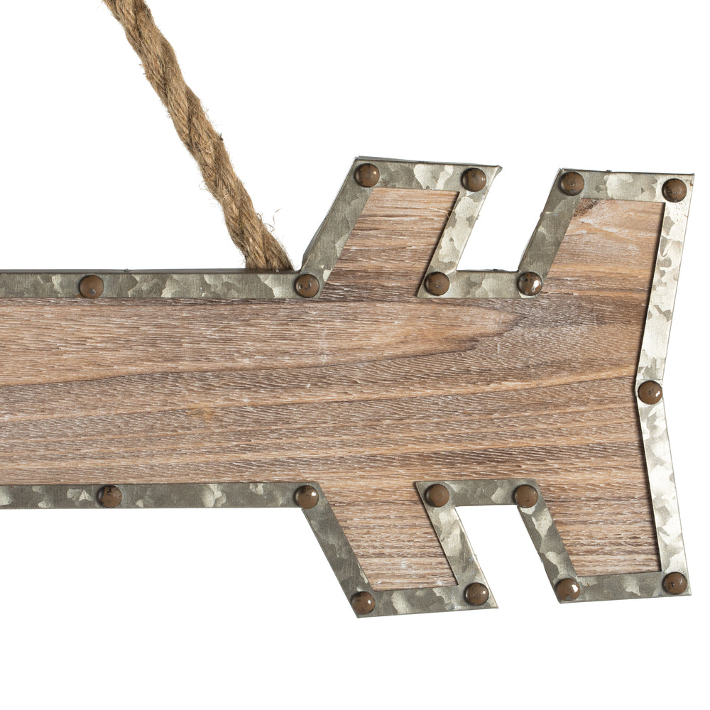 Vickerman 22" Rustic Arrow with Rope Hanger. This arrow features a wood body with a metal edge and a jute rope hanger. This arrow is the perfect wall decor that can incorporate into modern and rustic decor. It measures 22" L x 6.75" H x 0.25" W.   70% WOO