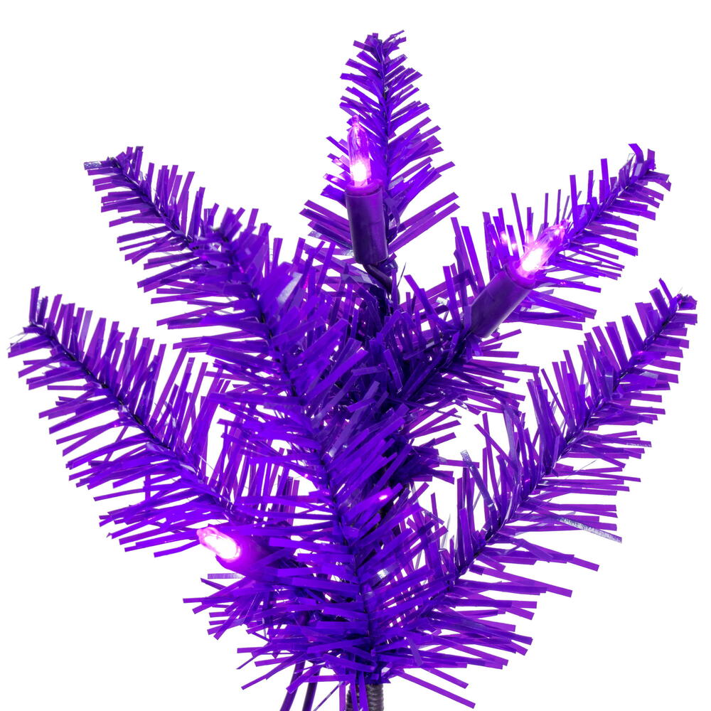 Vickerman 6.5' x 28" Purple Pencil Artificial Pre-Lit Christmas Tree with 400 Dura-Lit® Purple LED Mini Lights. It measures 78 inches tall, and 28 inches wide, which is considered a pencil profile. This tree boasts 712 tips for a realistic look. Pre-lit w