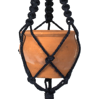 Vickerman 4.5" Terracotta Pot in Black Rope Hanger. This terracotta pot is cradled in a navy blue rope hanger. This pot incorporates great in modern decor. This pot measures 4.5 inches tall and 5.75 inches wide.   50% TERRACOTTA 50% POLYESTER
