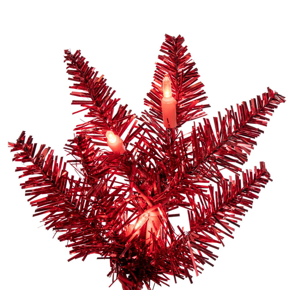 Vickerman 7.5' x 32" Red Tinsel Pencil Artificial Pre-Lit Christmas Tree with 450 Dura-Lit® Red LED Mini Lights. It measures 90 inches tall, and 28 inches wide, which is considered a pencil profile. This tree boasts 965 tips for a realistic look. Pre-lit