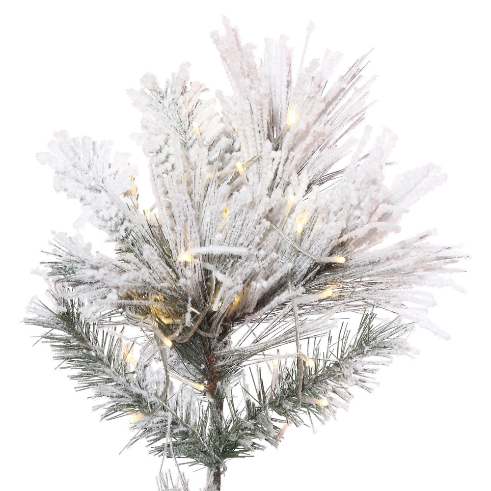 Vickerman 4.5' x 30" Flocked Atka Slim Artificial Christmas Tree Warm White LED lights.