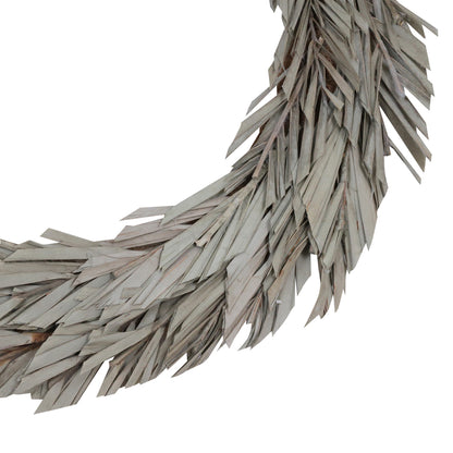Vickerman Natural Botanicals 24" Natural Canna Leaf Wreath. This wreath measures 24 inches in diameter. It features natural canna leaves on a coco fiber base. This is a dried and preserved natural product.