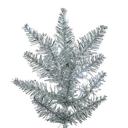 Vickerman 7.5' x 32" Silver Pencil Artificial Pre-Lit Christmas Tree with 450 Wide Angle 5mm 32 Function Remote Controlled RGB LED Mini Lights. It measures 90 inches tall, and 32 inches wide, which is considered a pencil profile. This tree boasts 965 tips