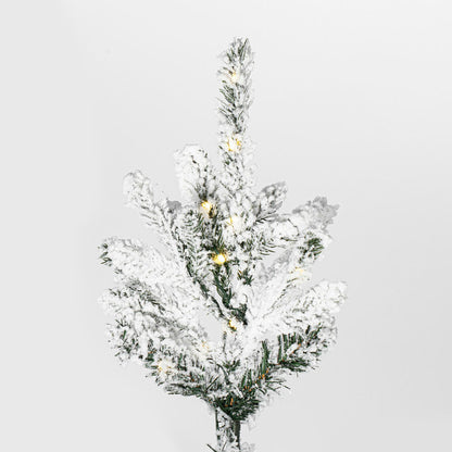 Vickerman 7.5' x 57" Flocked Yukon Display Artificial Christmas Tree with Warm White LED Lights.
