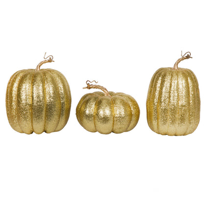 Vickerman 8" Gold Pumpkins Set of 3. Three pieces assorted Fabric pumpkin with polystyrene inner.