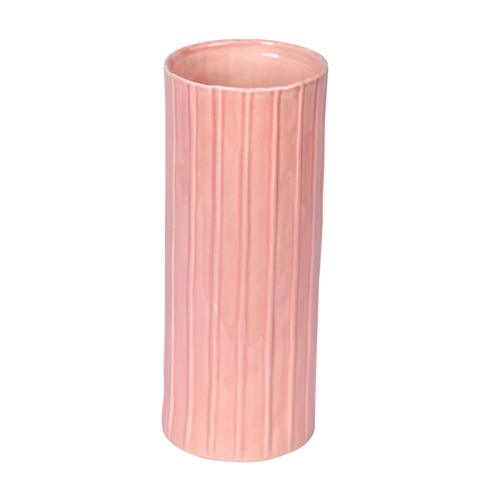 Vickerman 11" Sand Pink Ceramic PotThis simple pot ties in with any modern decor. Let this pot stand on its own or pair with a faux floral for a finished look. It measures 11" H x 4.5" W.   100% CERAMIC