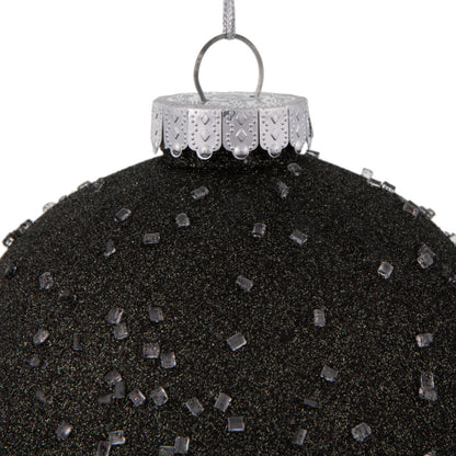 Vickerman 6" Gunmetal Ice Ball Ornament. This textured ornament has a rough and icy look with a hint of delicate sparkle. Incorporate these ornaments into your holiday design for added texture. Includes 4 pieces per pack. Made with shatterproof plastic.