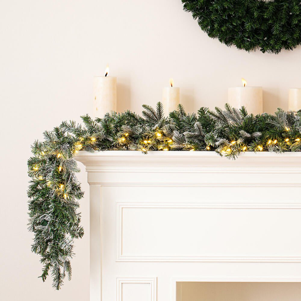 Vickerman 9' x 14" Frosted Douglas Fir Artificial Garland with Warm White LED Lights.