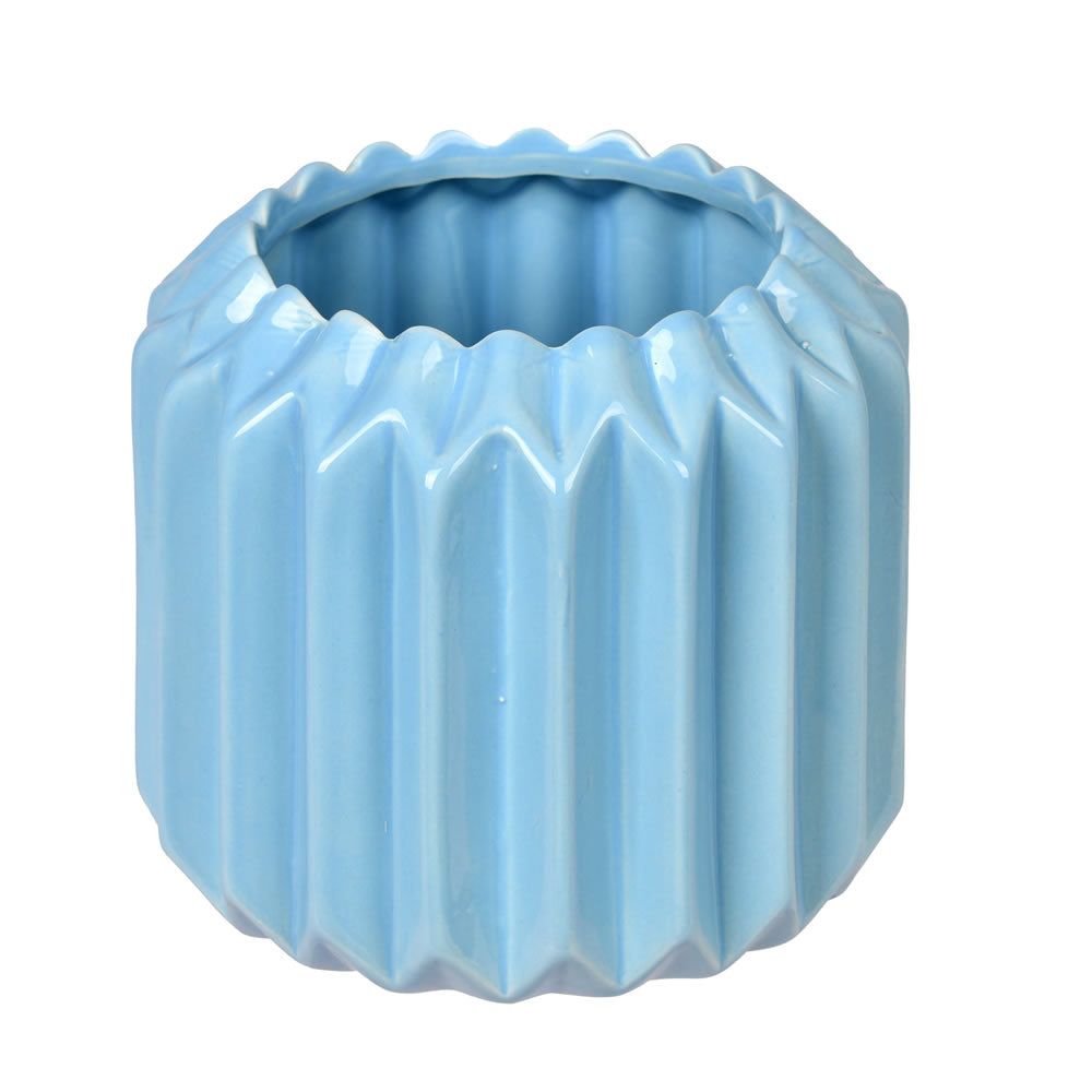 Vickerman 5.25" Powder Blue Ceramic Pot. Let this pot stand on its own or pair with a faux floral for a finished look. It measures 5.25 tall by 5.5 inches wide.   100% CERAMIC
